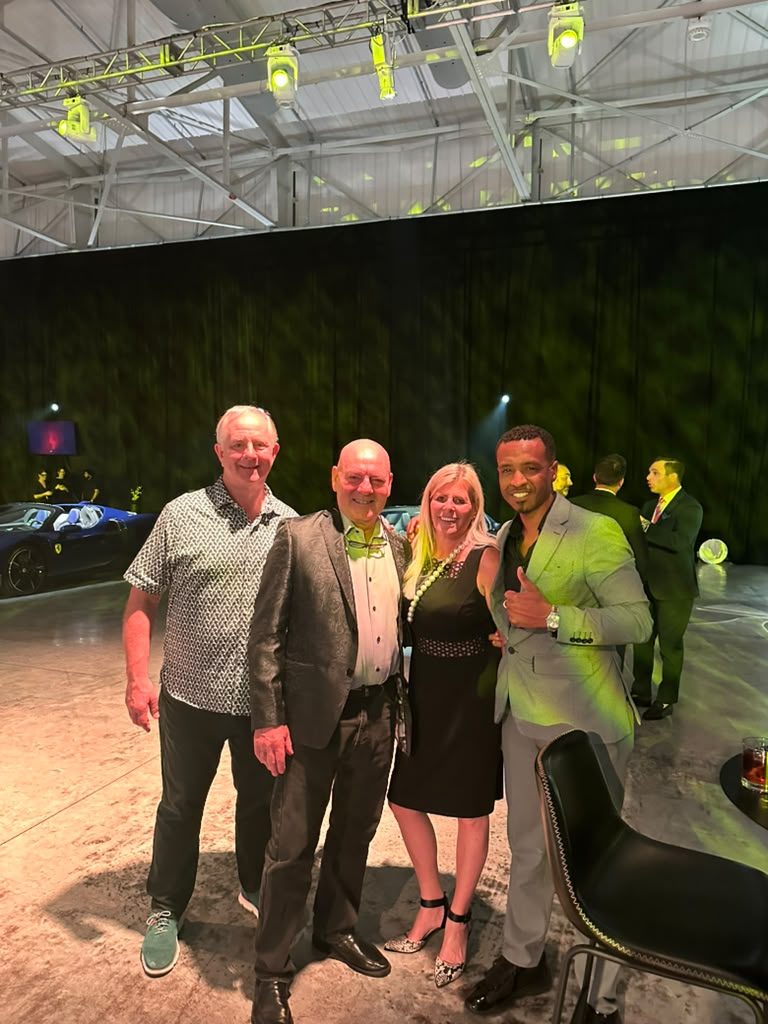 Buck Vaughan and Chairman Elijah John Bowdre with friends at the Ferrari Luce evening in Coconut Grove